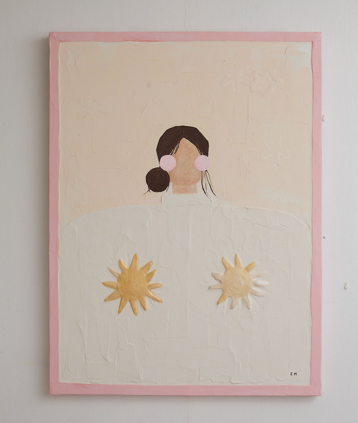 Framed artwork of a stylized portrait with abstract elements on a beige background